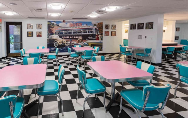 Bright retro dining area with colorful tables and chairs