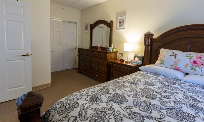 Cozy private resident room with a large bed