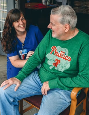 Staff member and resident enjoying a conversation