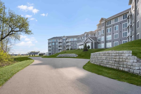 Exterior view of Rivertown Ridge facility with pathways and green spaces