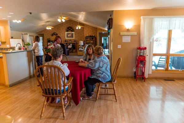 Residents engaged in a group activity in the common area