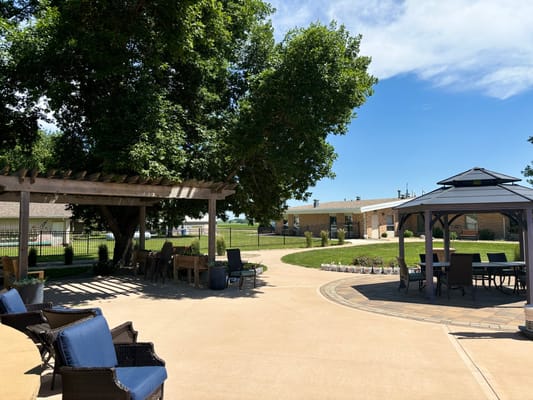 Outdoor space with seating and gazebo at the facility