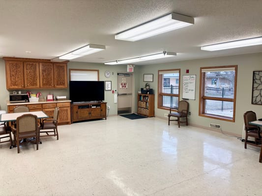 Common area with seating and television