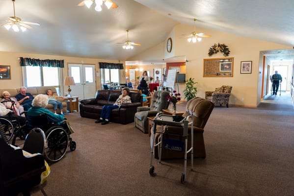 Residents socializing in a common area lounge