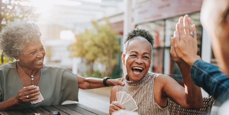 Residents enjoying a card game outside