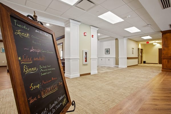 Interior hallway with a chalkboard menu display