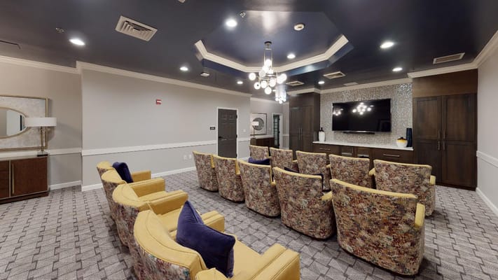 Interior view of a cozy common area with seating