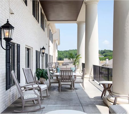 Outdoor seating area with chairs and tables