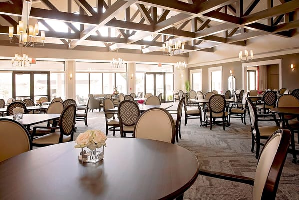 Bright dining room with elegant seating and decor