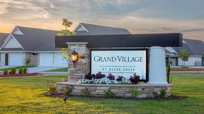 Exterior view of Grand Village at Clear Creek sign