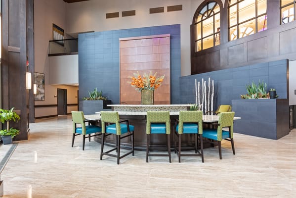 Interior lobby with seating and floral decor