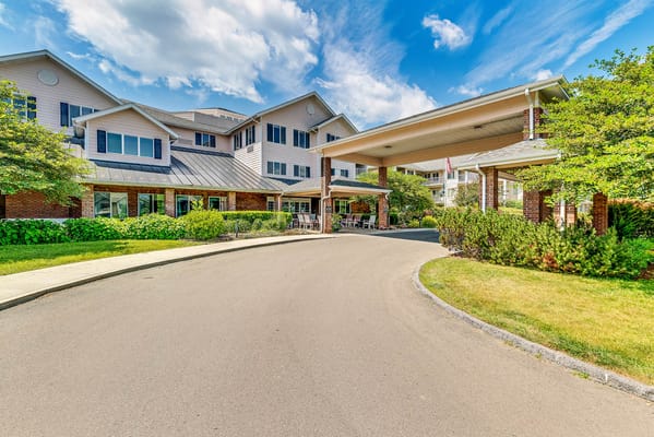 Entrance to Solstice Senior Living at Bangor with landscaping