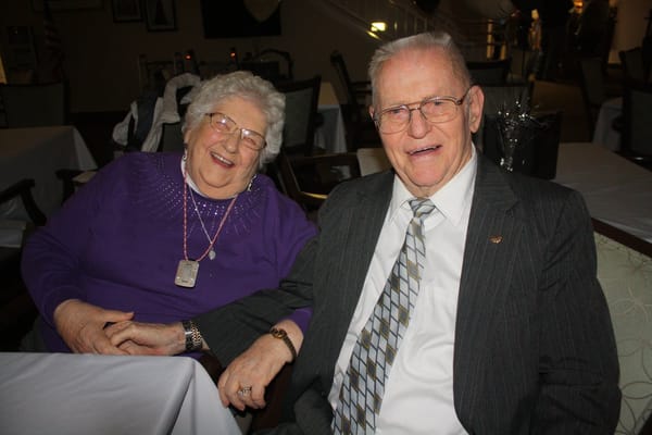 Two residents enjoying time together, smiling