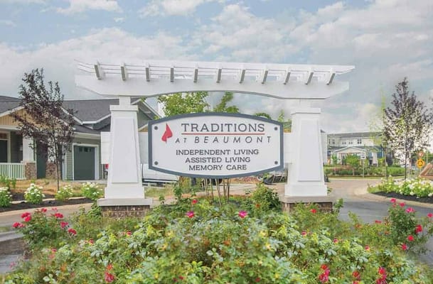 Sign for Traditions at Beaumont with gardens