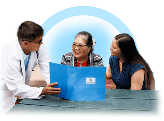 Healthcare professional interacting with a resident and visitor