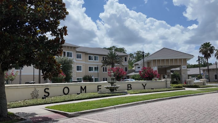 Exterior view of Somerby Lake Nona entrance with landscaping