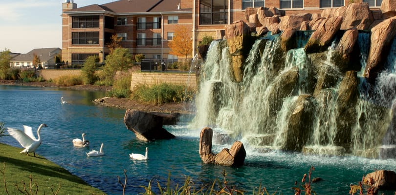 Waterfall feature in a landscaped outdoor area