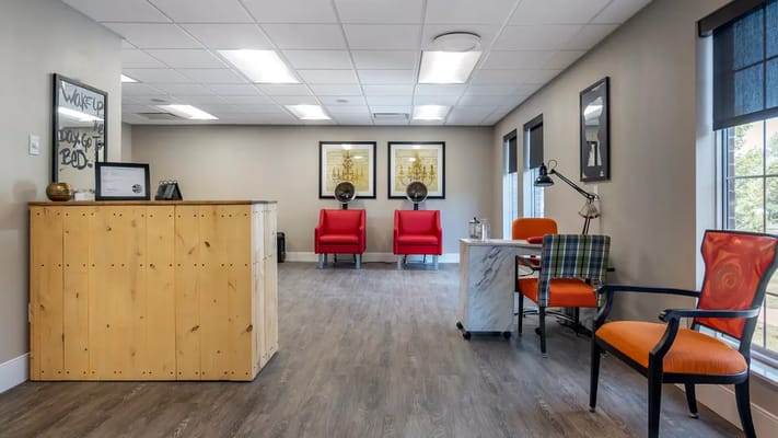 Interior view of a bright common area with seating