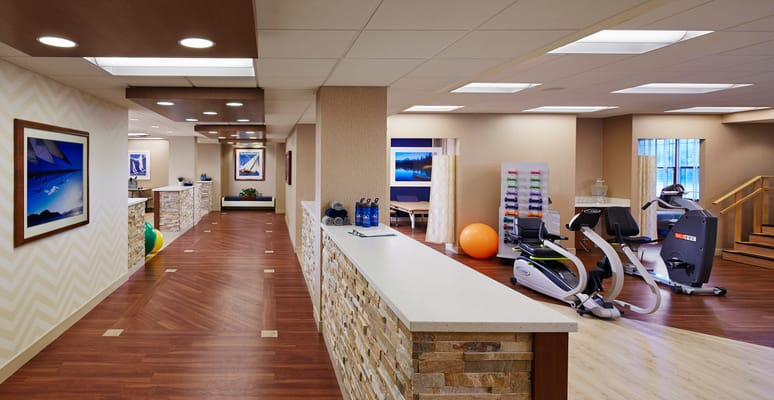 Fitness area with exercise equipment and seating