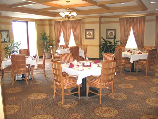 Dining room setup with elegant decor and tables