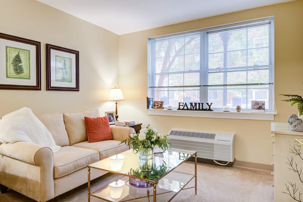Cozy living room with comfortable seating and family decor