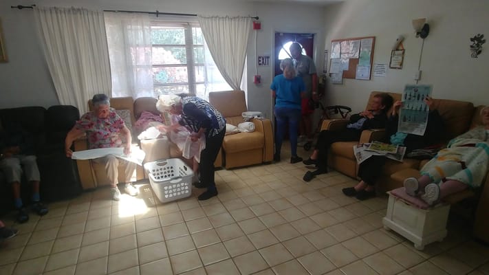 Residents engaging in an activity in a common area