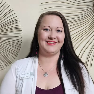 Staff member posing in the facility's interior