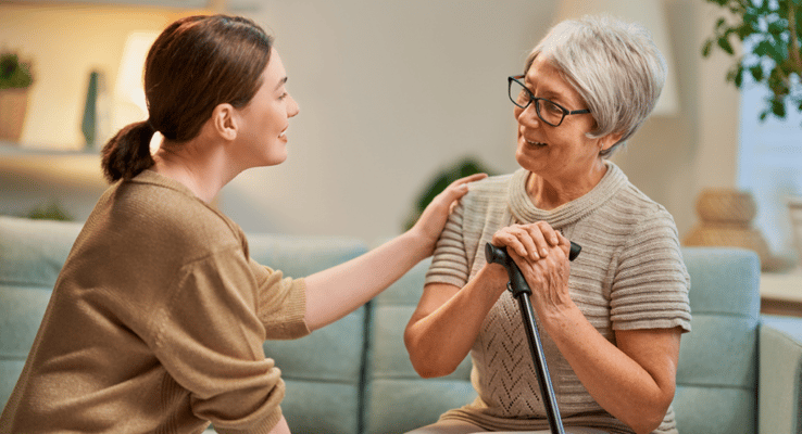 Caregiver interacting with a senior resident at home