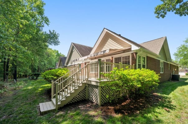 Exterior view of a senior living facility with outdoor space