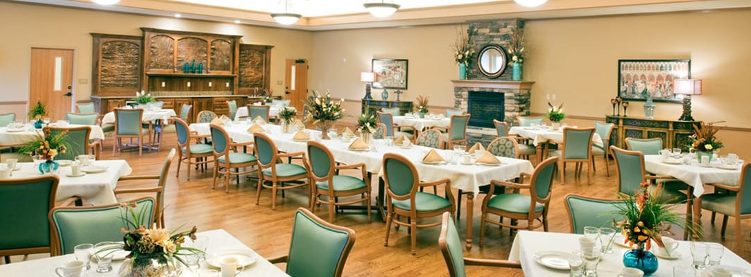Bright dining room set up for residents