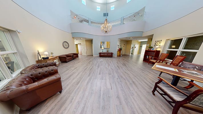 Interior view of a spacious common area with seating