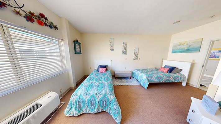 Private resident room with two beds and decorations