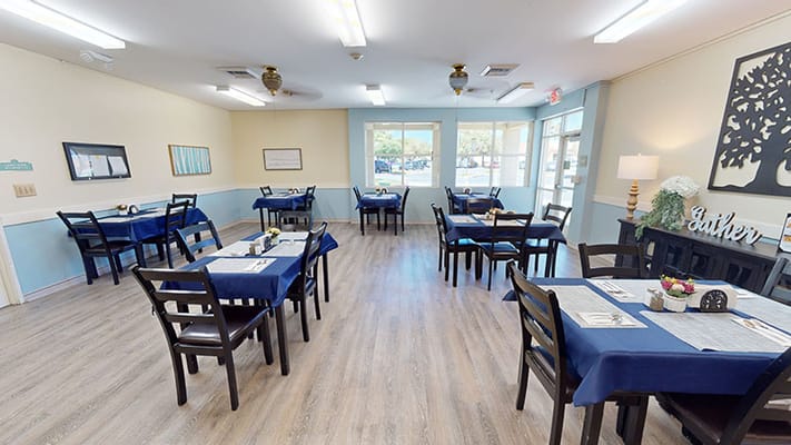 Dining room area with tables and chairs