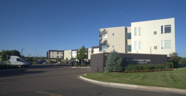 Entrance to Modena Reserve at Kensington with landscaping.