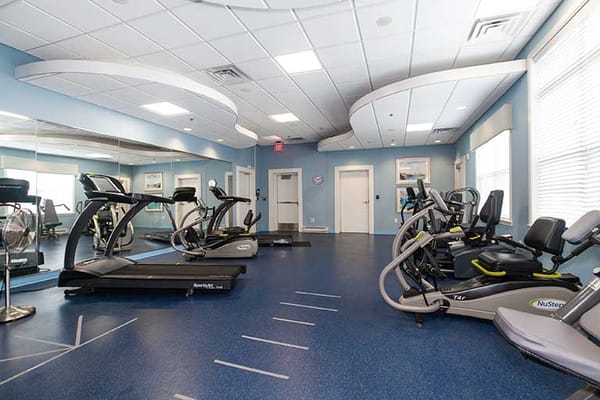 Interior view of a fitness room with exercise equipment