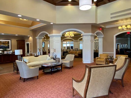 Interior view of a cozy common area with seating.