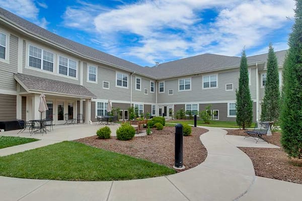 Courtyard of a senior living facility with seating areas