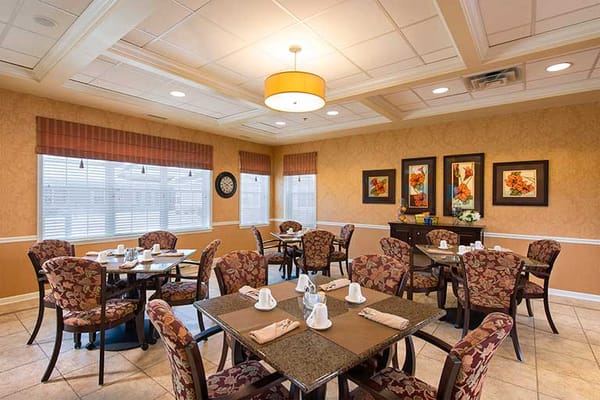 Bright dining area in the facility with tables and chairs