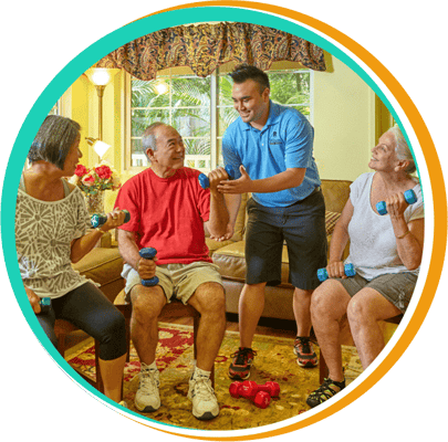 Residents participating in a fitness activity with staff guidance