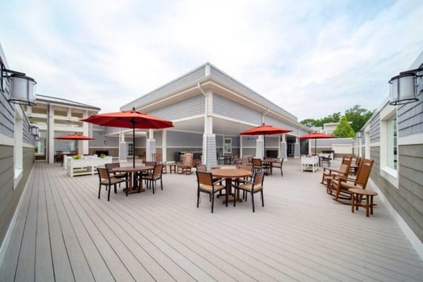 Outdoor patio with seating and umbrellas