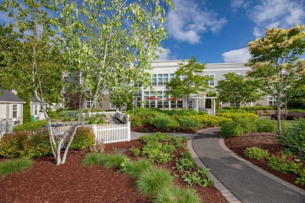 Beautiful garden path leading to the facility entrance