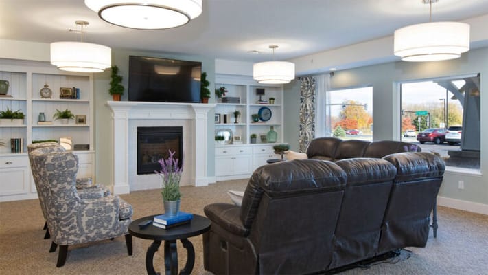 Cozy common area with seating and fireplace