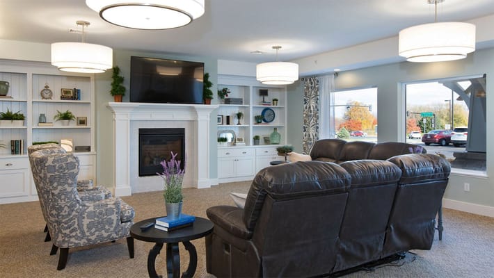 Cozy common area with seating and fireplace