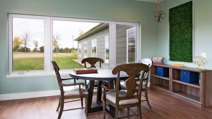 Bright common area with a view of the outdoors