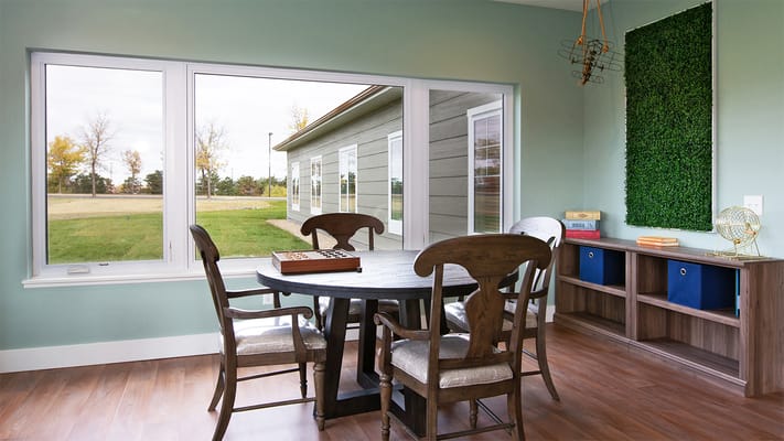 Bright common area with a view of the outdoors