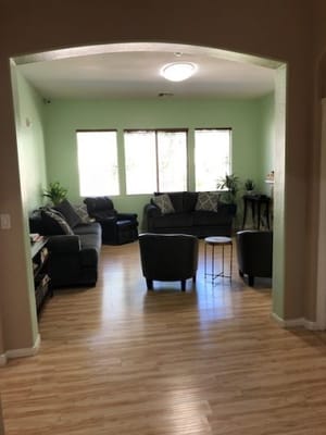 Cozy common area with seating and natural light