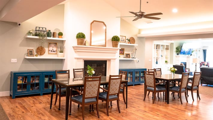 Bright common area with tables and chairs