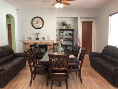Interior common area with seating and clock