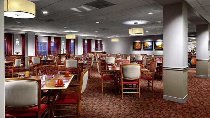 Dining area with tables set for meals