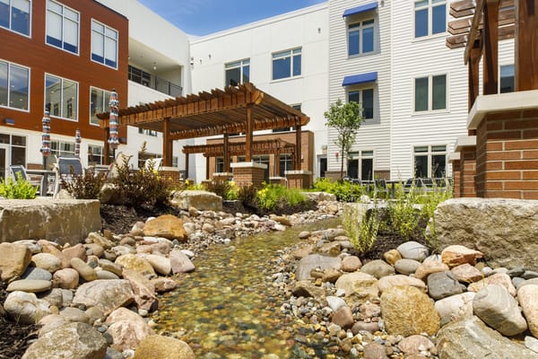 Beautiful garden area with a stream and seating